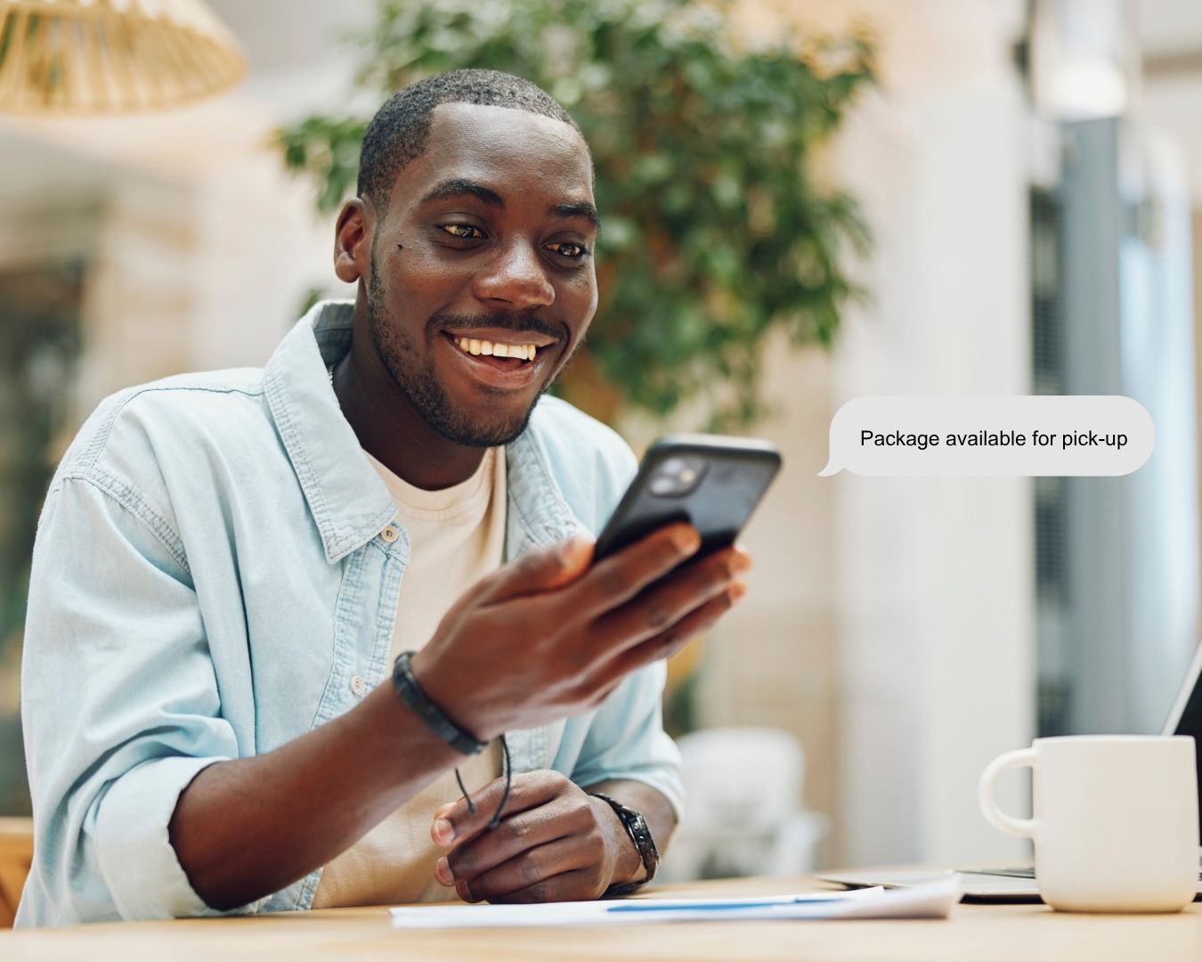 a person receiving a package room notification from hellopackage